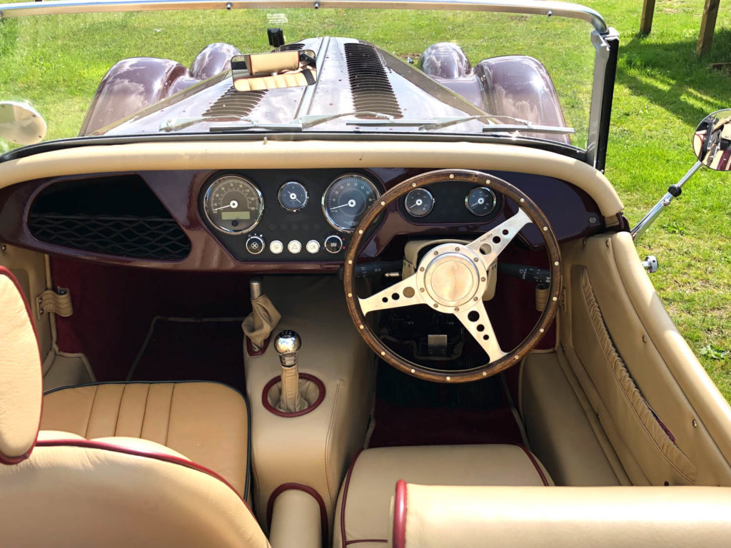 Top down view of tan leather cabin in car
