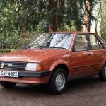 Parked up orange MK3 Ford Escort