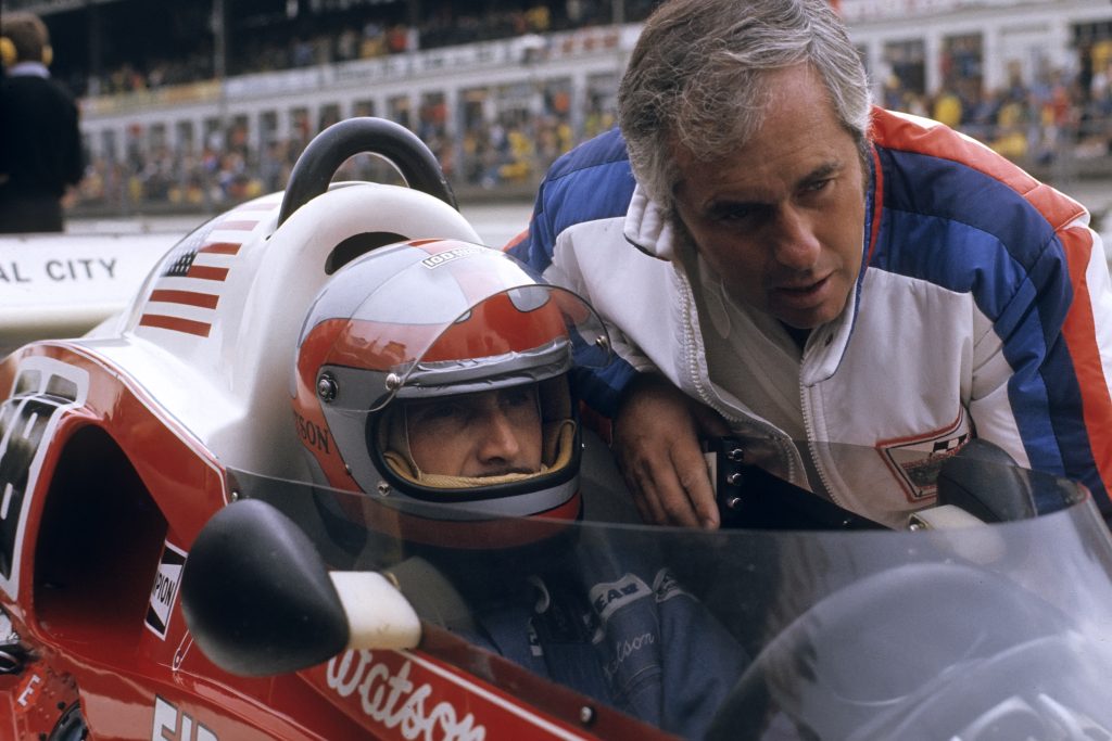 John Watson with team owner Roger Penske at the 1976 German Grand Prix. Paul-Henri Cahier /Getty Images