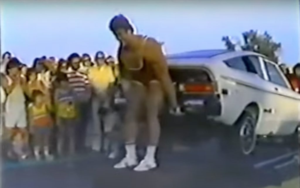 Lou Ferrigno about to rip the bumper off a Datsun B210