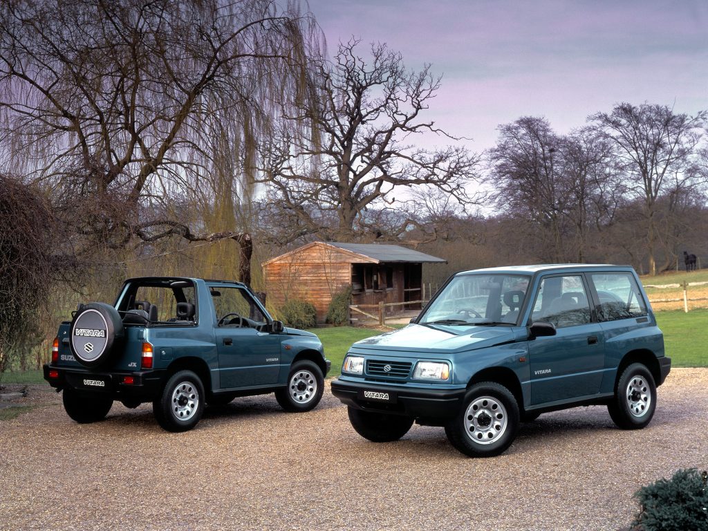 Two green Suzuki Vitara's
