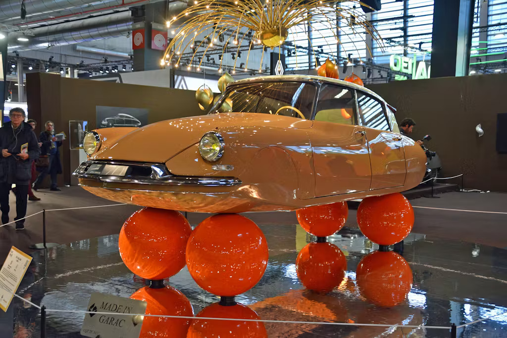 The Citroen DS balloon car on display at Retromobile 2025. Front facing.