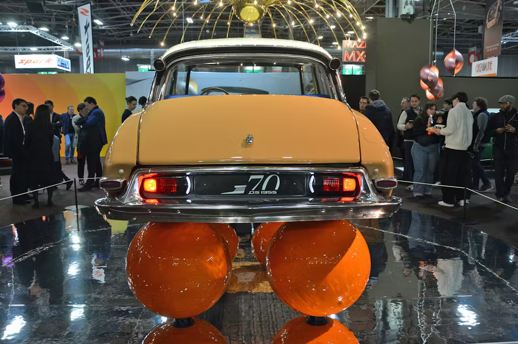 The Citroen DS balloon car on display at Retromobile 2025. Rear profile.