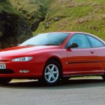 Red Peugeot 406 Coupe