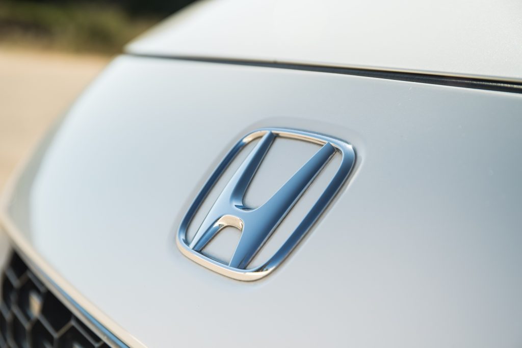 Close up of Honda badge white Honda CRZ