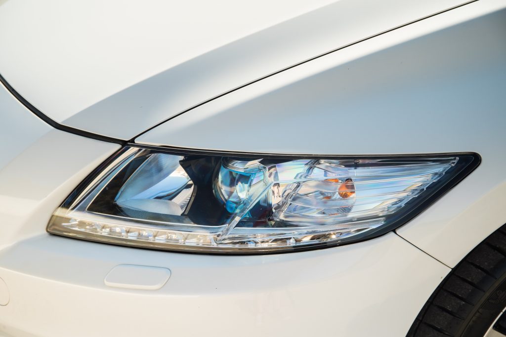 Front headlamp on white Honda CRZ