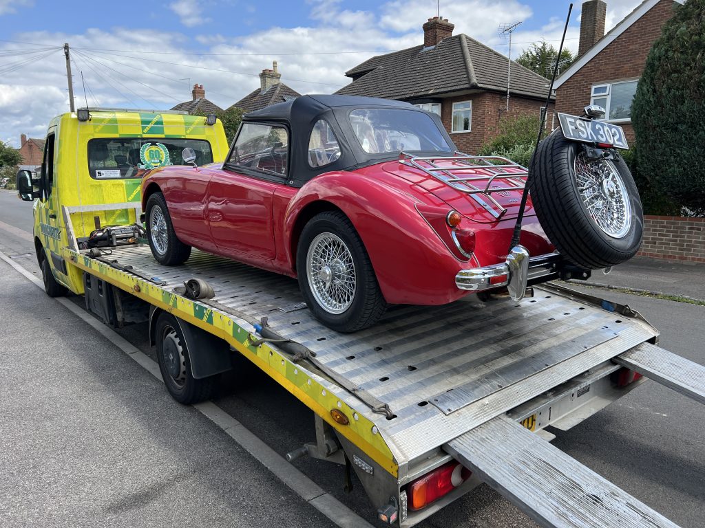 Rear view of MGA on tow truck