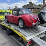 Rear view of MGA on tow truck