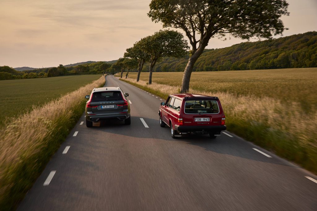 Volvo 240 and Volvo XC60 driving on road