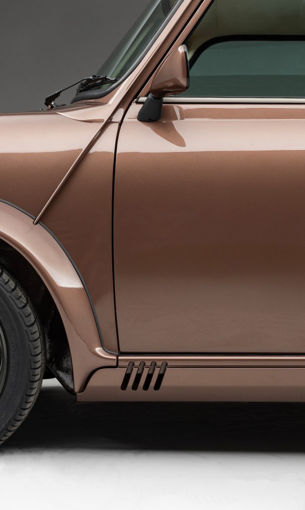 Passenger door and wheel arch of Mini car