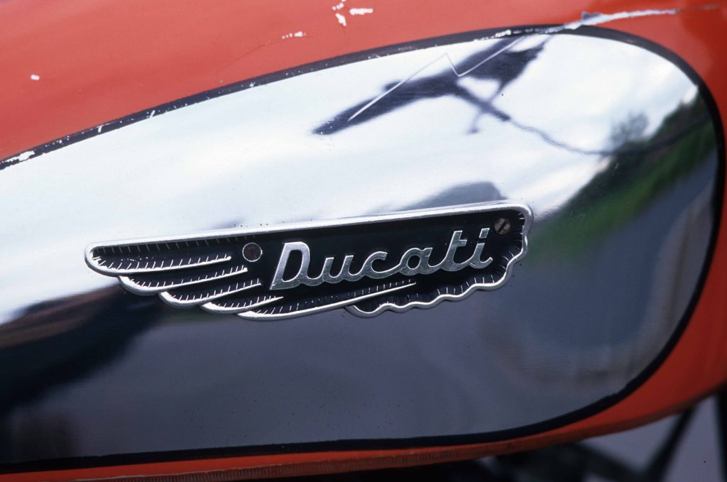 Ducati badge on silver and red motorbike tank