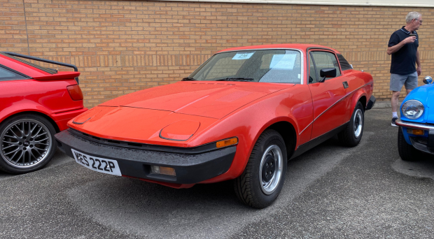 Front view of a red classic TR7