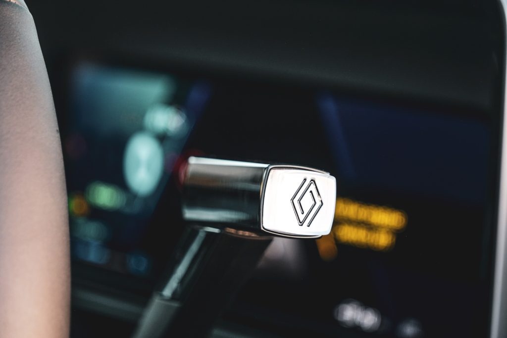 Renault logo embossed indicator stick inside a car