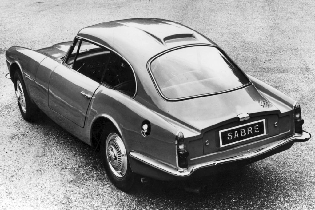 Rear view of a car in greyscale