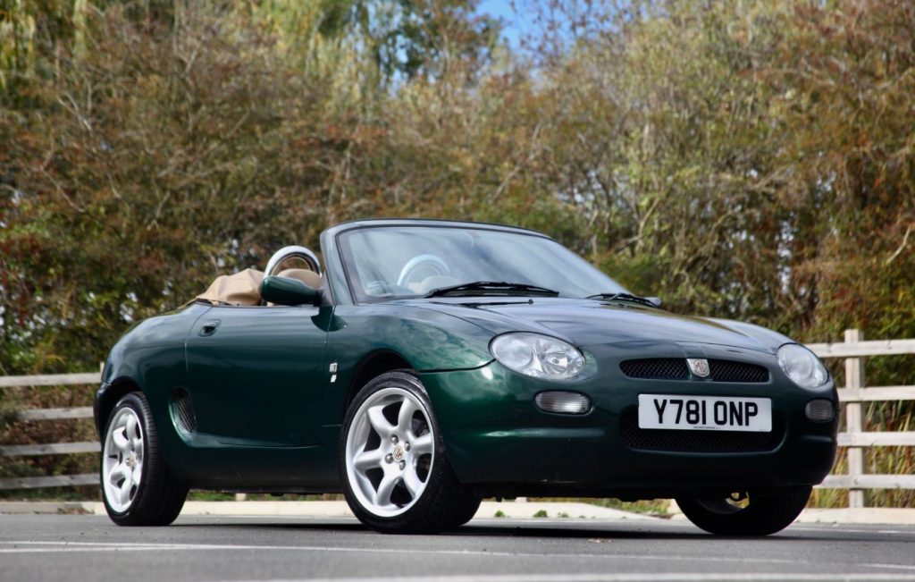 Front view of a green convertible MGF sports car
