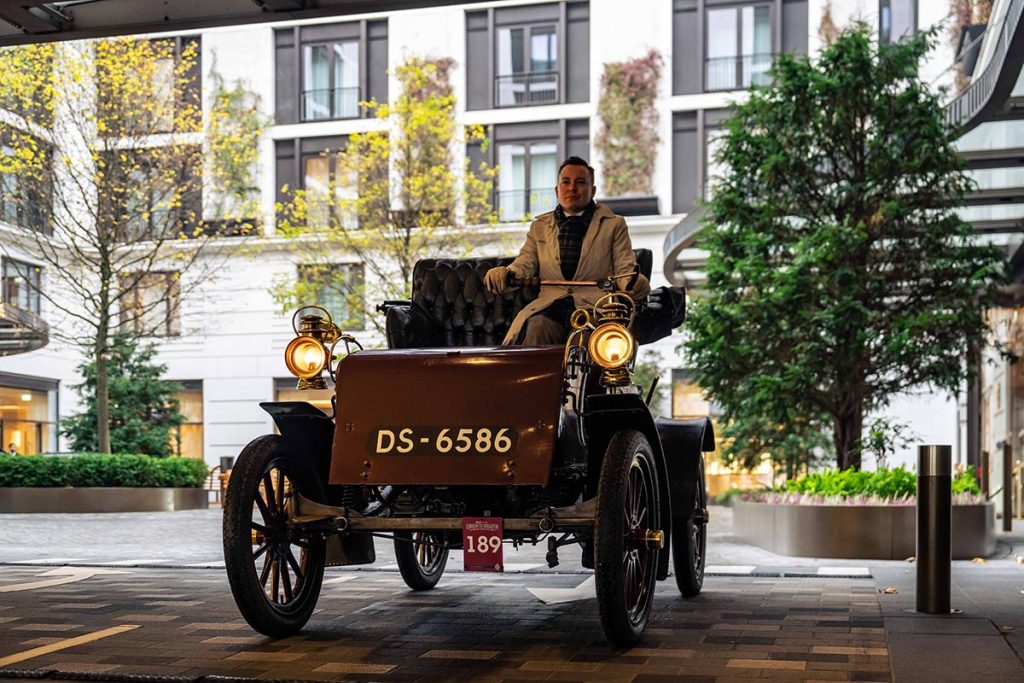 Man sitting in purple Knox Model C 