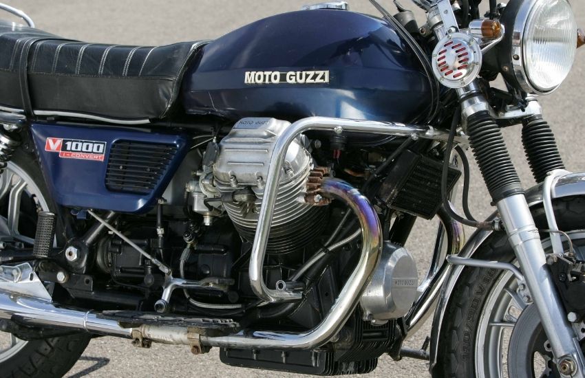 Side view of a metallic blue motorbike