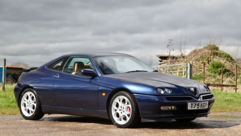 Blue Alfa Romeo GTV parked up