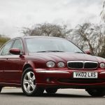 Front view of a red Jaguar X-Type