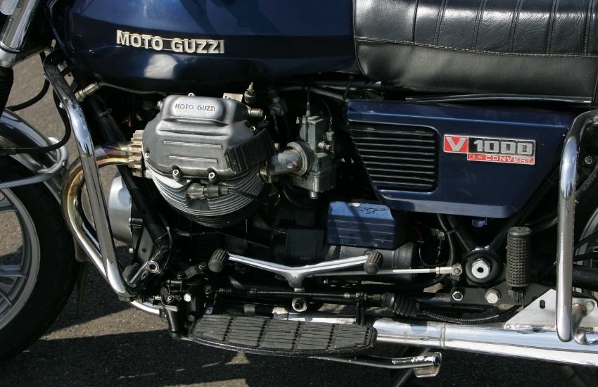 Side view of a metallic blue motorbike