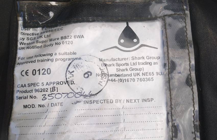 Close up of an inspection certificate for a car