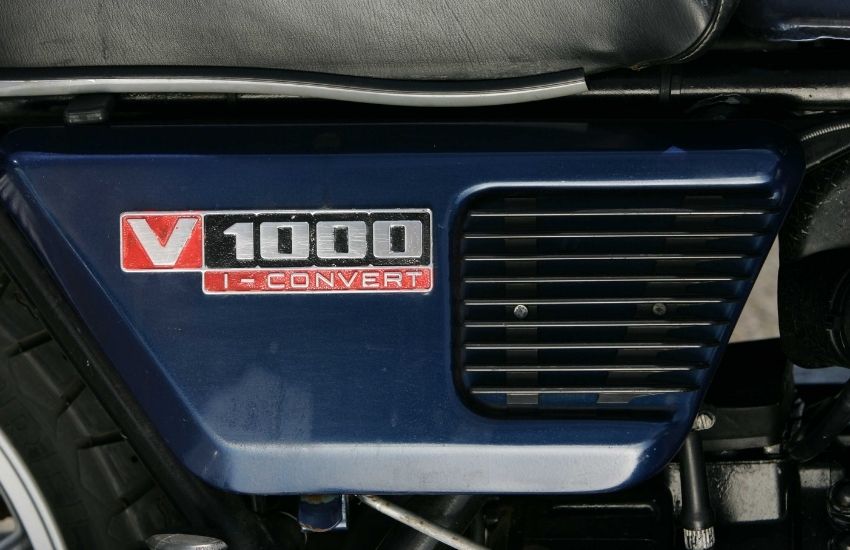 Close up of the V1000 Convert badge on a motorbike