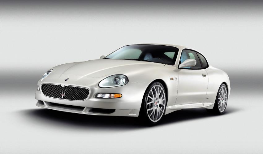 Front view of a pearlescent white Maserati GranSport