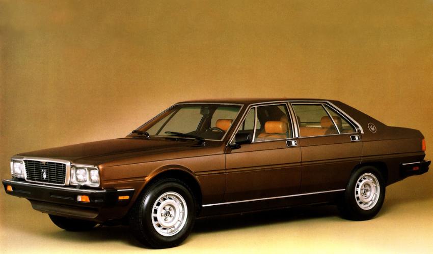 Side view of a brown Maserati Quattroporte