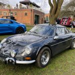 Classic car parked on grass