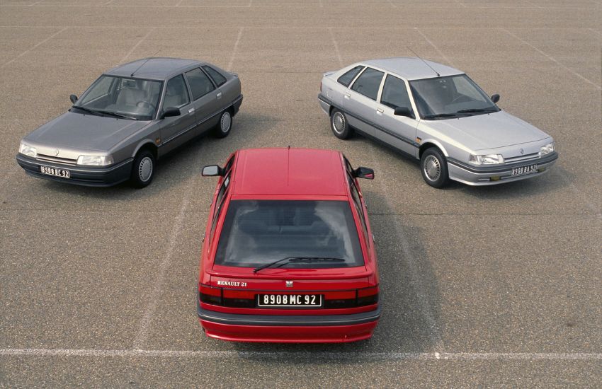 Three Renault cars parked side by side in a car park