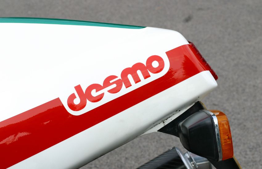 Close up of a red sticker on a motorbike