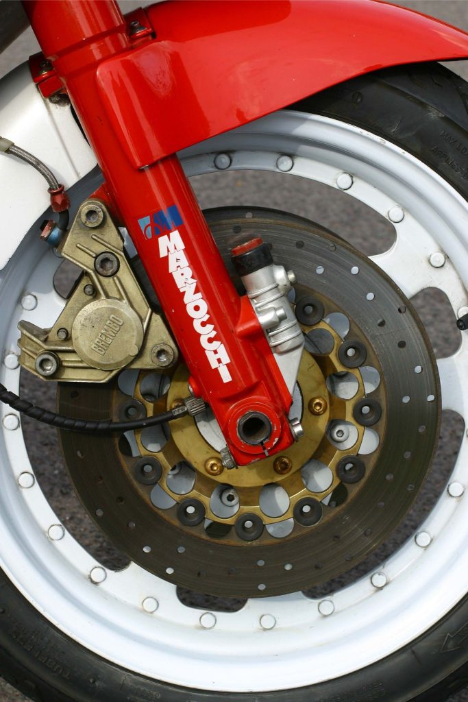 Close up of a wheel and brake of a classic motorbike