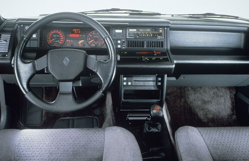 Dashboard and steering wheel inside a classic car