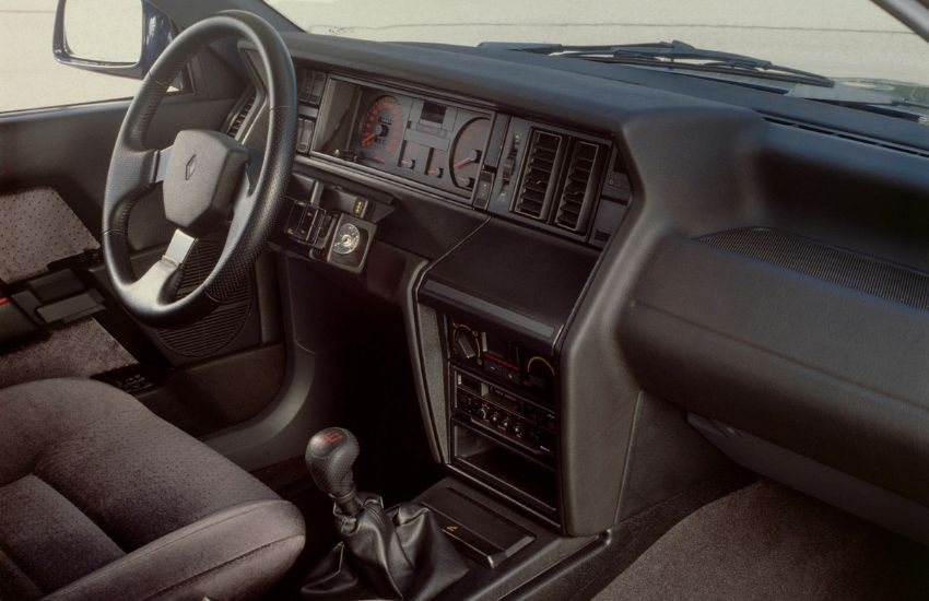 Dashboard and steering wheel inside a classic car
