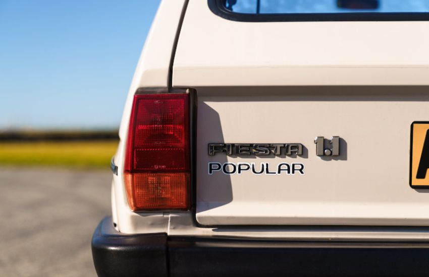 Insuring a classic car such as a 1983 Ford Fiesta parked on a road