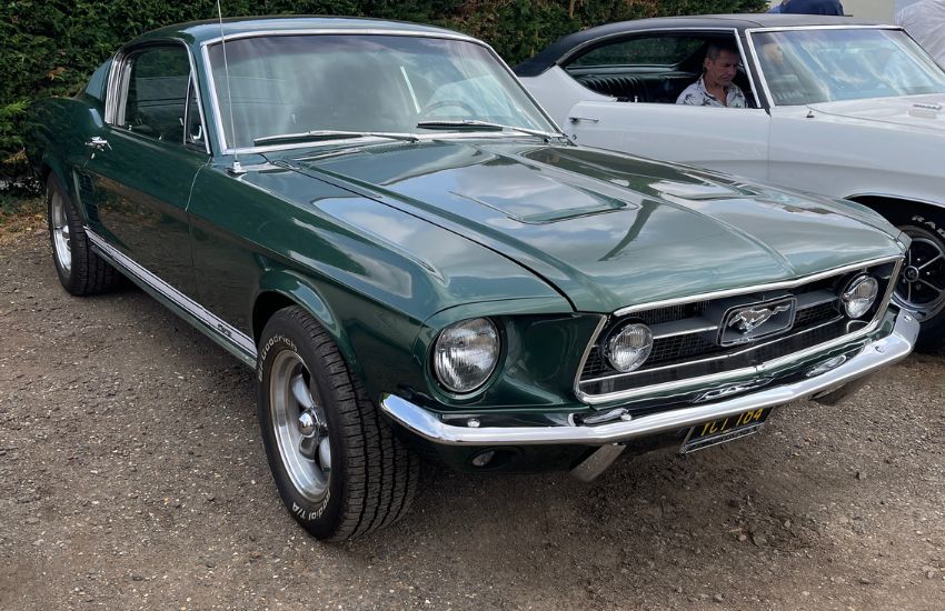 Metallic green 1967 Ford Mustang Fastback classic American muscle car parked up