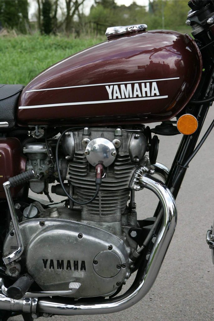 Metallic brown petrol tank of a classic motorbike