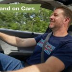 Paul Cowland driving a car
