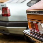 Close up of the rear lights of an orange classic car