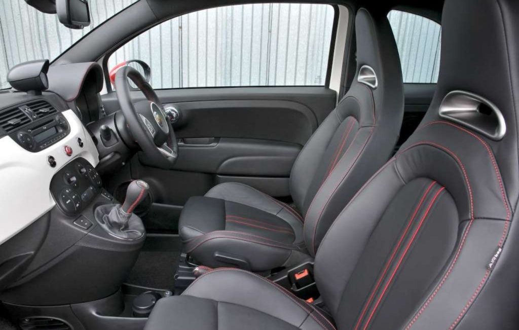 Black leather interior front seats of a car