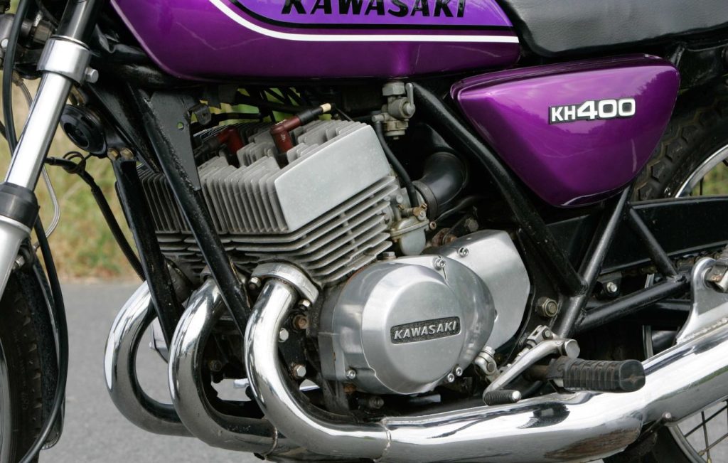 Air-cooled, three-cylinder, two-stroke engine of a Kawasaki motorcycle