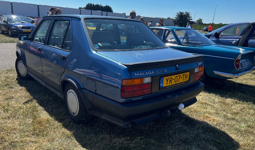 Rear view o a blue SEAT Malaga GLX 1.5 parked at a car show