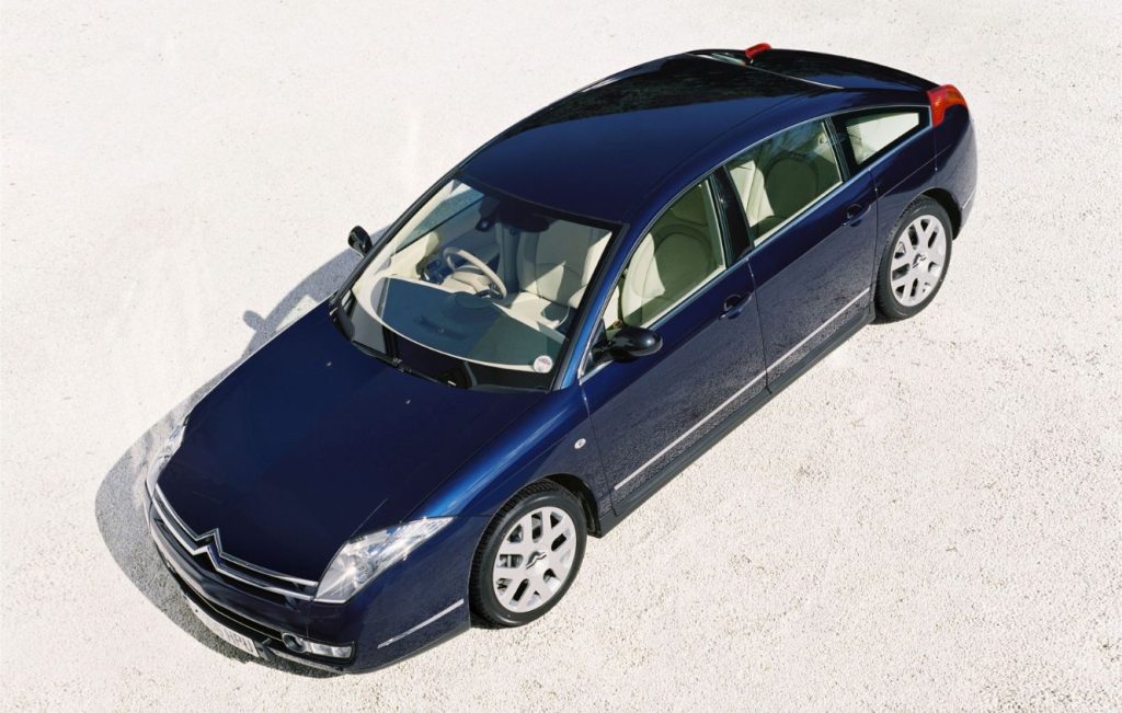 Dark blue Citroën C6 luxury executive car with a light-colored interior
