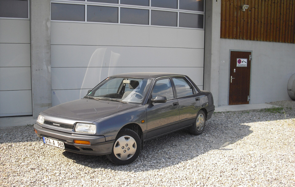 Daihatsu Applause parked