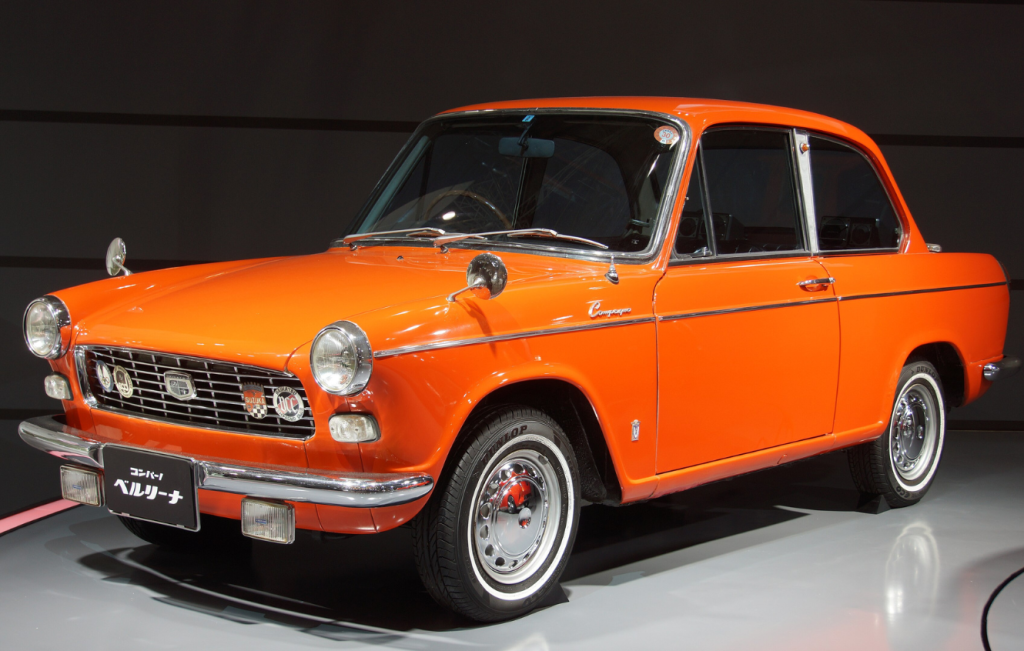 Orange Daihatsu Compagno parked up