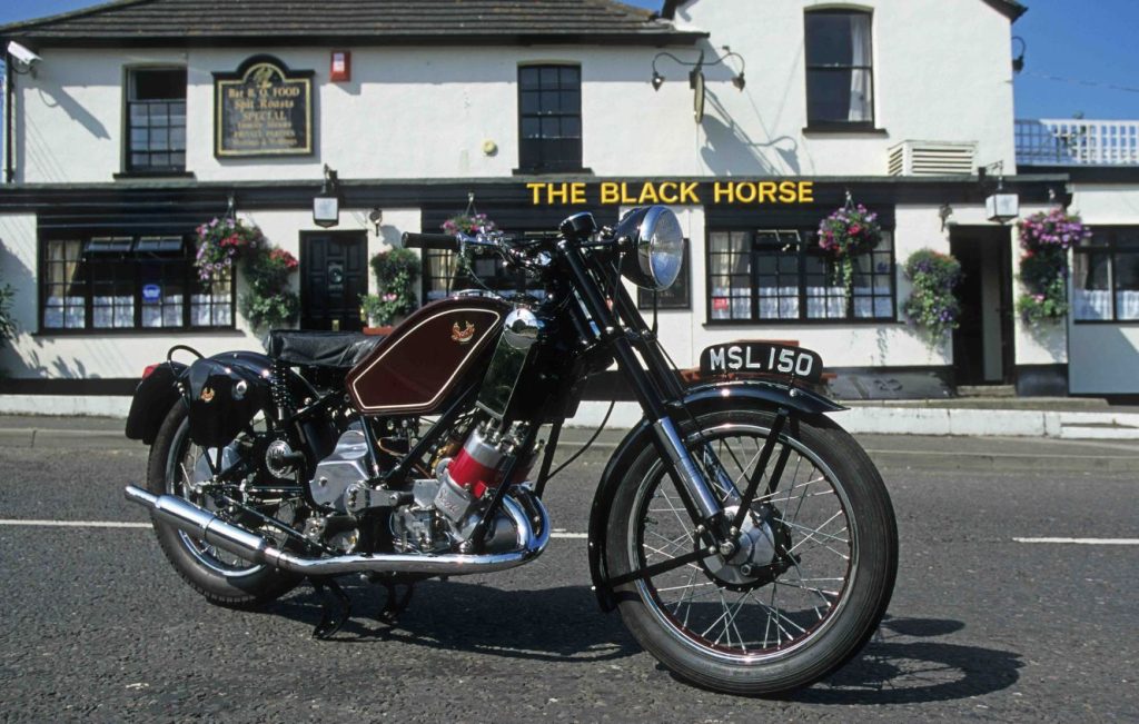 Scott Flying Squirrel classic motorbike parked up in front of a pub
