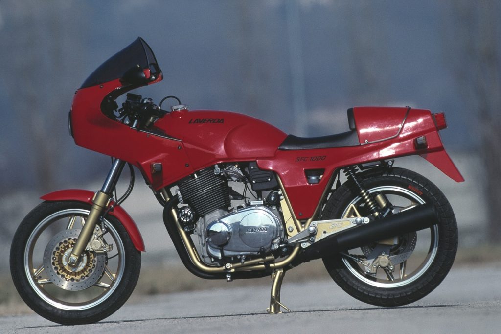 Side view of a red Laverda classic motorbike parked up