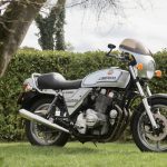 Laverda Mirage motorbike parked on grass in front of a bush