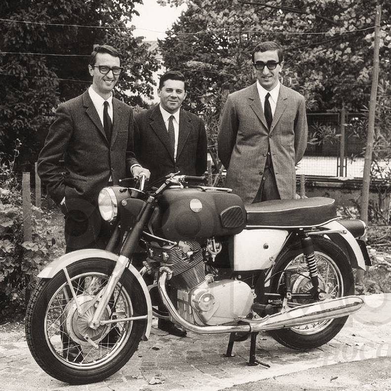 Three members of the Laverda family with a Laverda 750 classic motorbike