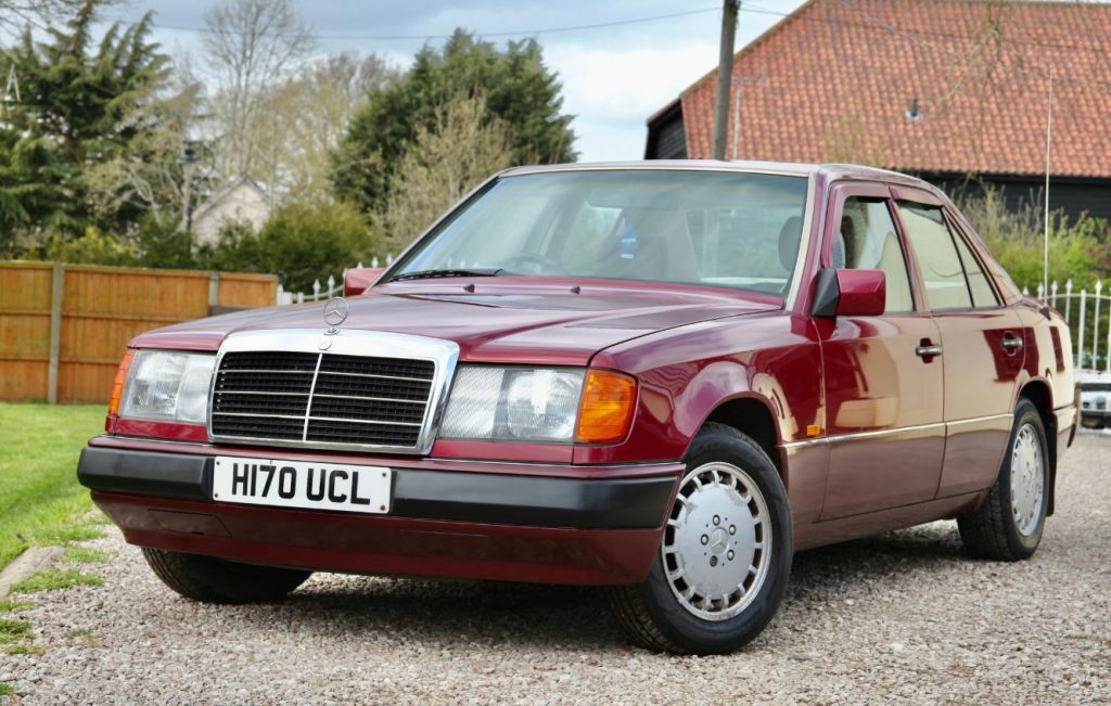 Mercedes-Benz W124 E-Class saloon in a metallic Almandine Red finnish